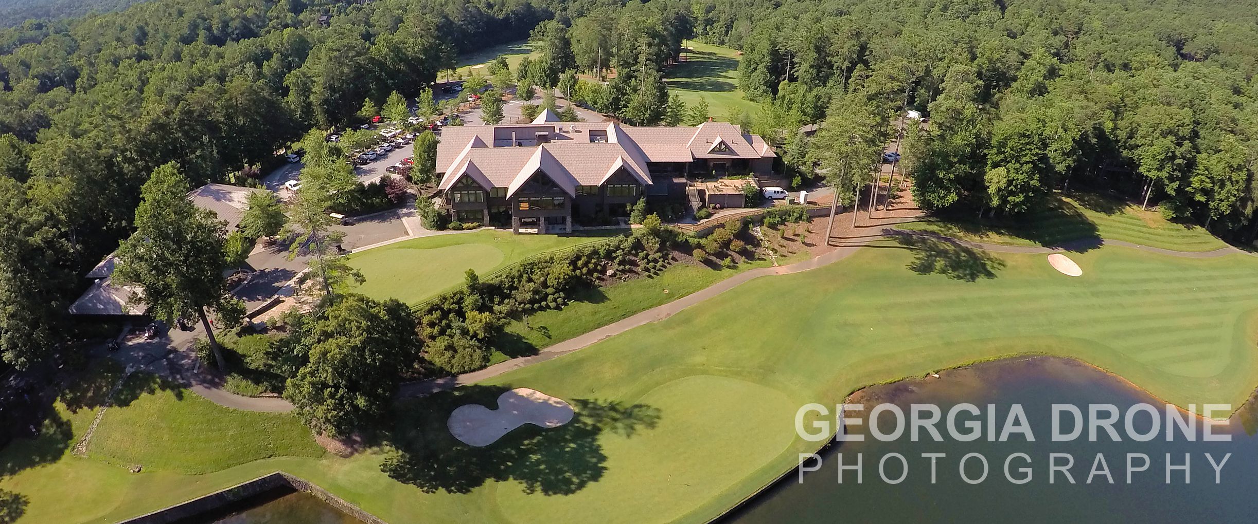 Drone photography of Big Canoe clubhouse on golf course in Jasper, Georgia.